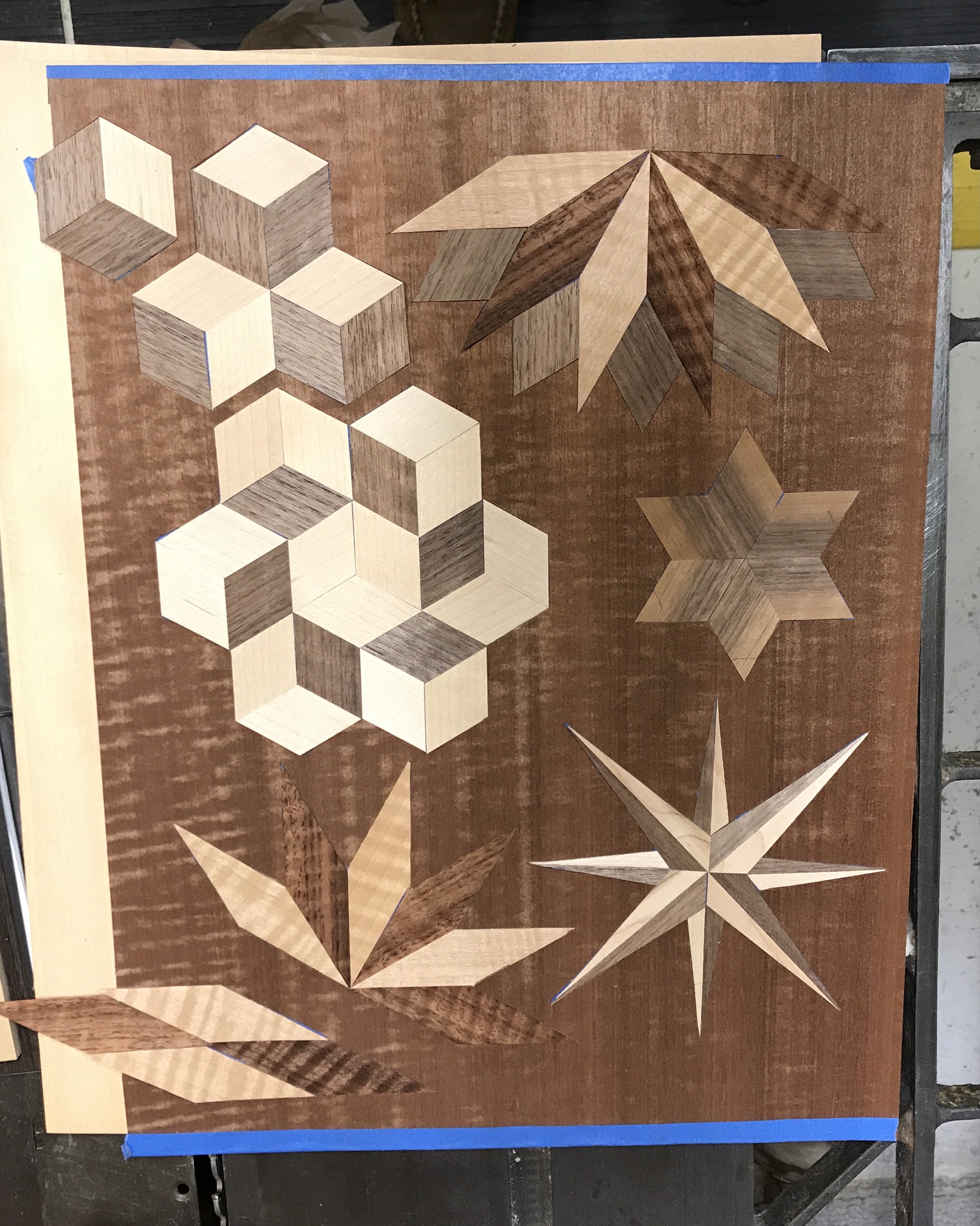 The to be glued side of the parquetry collage